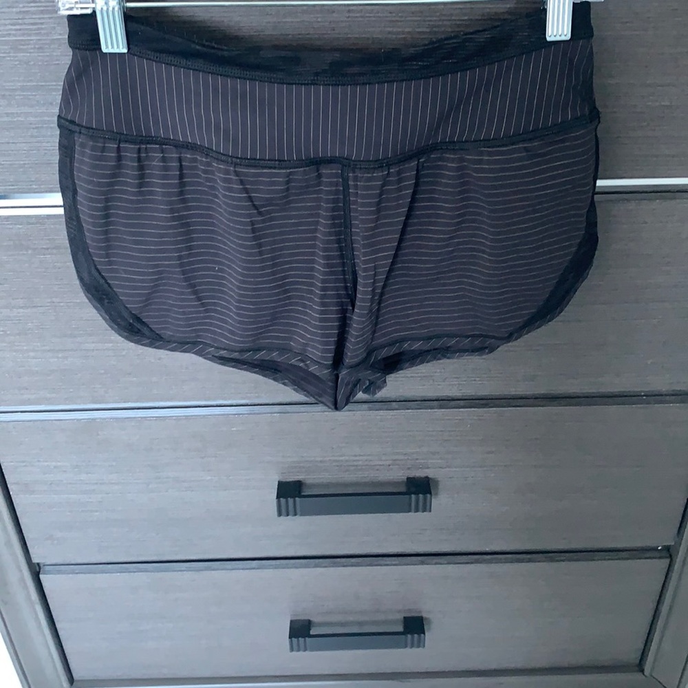 Lululemon, black with tan stripes, size 4